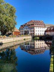 Fototapeta premium reflection of the houses on the river