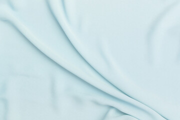 Waving blue fabric background, blank blue fabric texture background