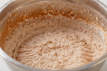 chocolate  whipped cream in metal bowl