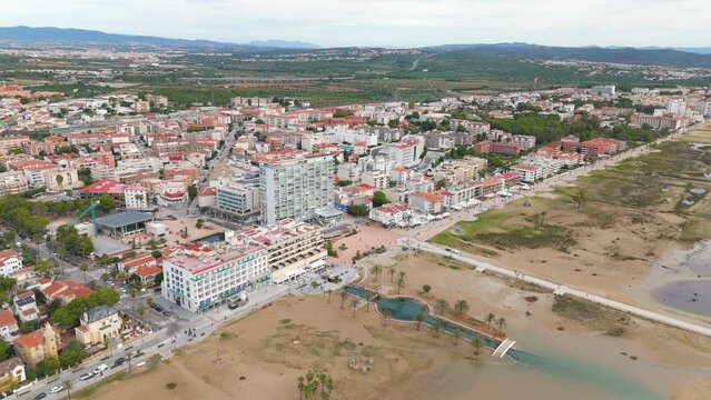 Aerial drone view of the coastal town named Comarruga in the province of Tarragona, Spain