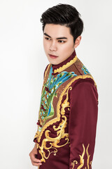 Asian man wearing Tang suit