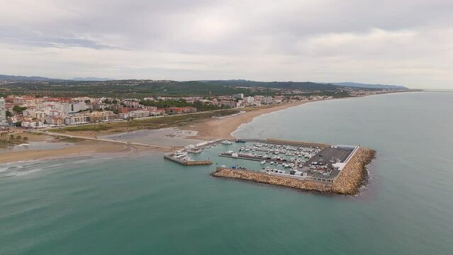 Aerial drone view of the marina in the Spanish coastal town named Comarruga
