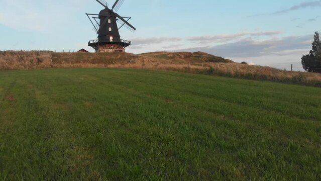 Flying towards old traditional Br&auml;cke M&ouml;lla at Nyhamnsl&auml;ge Sweden, aerial