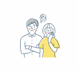 困った表情の若いカップル