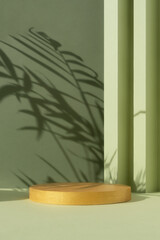 Golden podium on an abstract green background with a shadow of palm leaves. A scene with a...