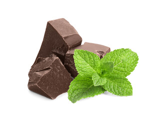 Milk chocolate chunks and mint leaves isolated on white
