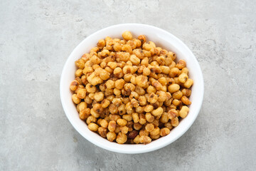Marning, heap of crispy roasted corn kernels, traditional snack from Indonesia
