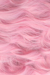Pink wavy hair pattern. Top view.