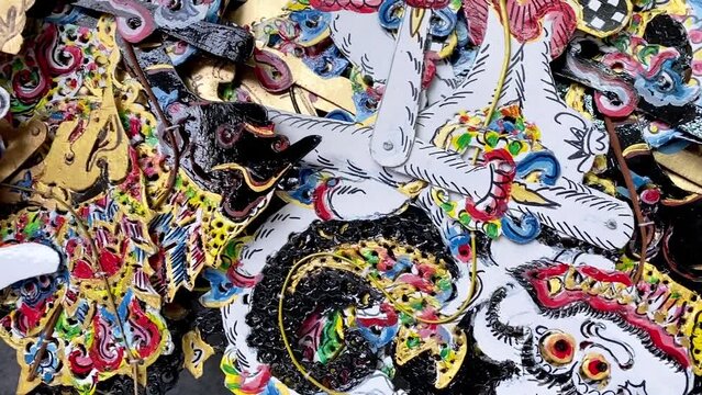 Medium shot of traditional wayang kulit of Indonesian culture