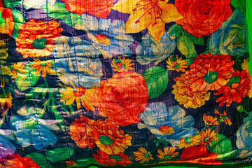 fabric texture,fragment of fabric with colorful flowers, fragment of fabric of a beautiful home pillow