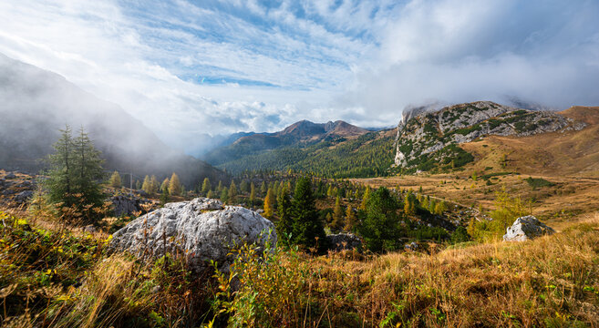Magnificent view of the Dolomite mountain landscape from the Valparola Pass on an autumn morning