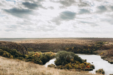 Obraz premium Beautiful natural scenery of river in Ukraine with rocks in background, top view.