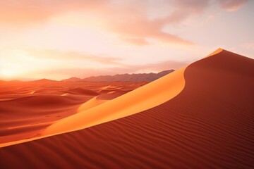 Fototapeta na wymiar Desert sand dunes at sunset. Majestic sand dunes in the desert bathed in the warm light of the setting sun.