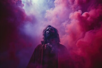 Jesus Christ against the background of colored smoke. 