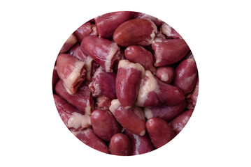 Fresh raw chicken, turkey or duck hearts on a ceramic plate with salt and spices