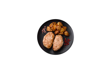 Delicious fresh chicken cutlets or meatballs with salt, spices and herbs