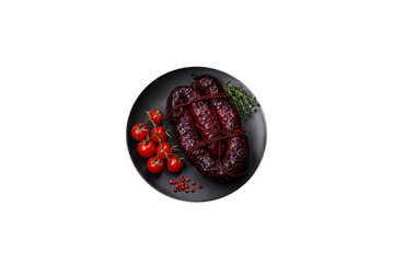 Delicious black blood sausage or black pudding with spices and herbs