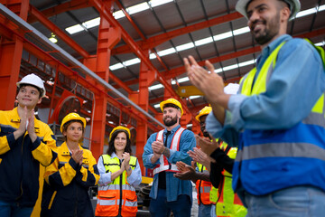 Blue collar worker work at metal sheet factory.