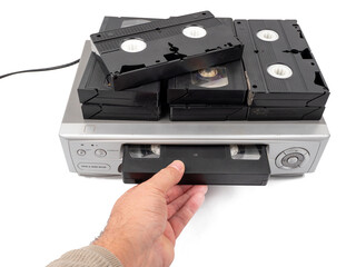 VHS cassette video recorder on a white background. Retro video recorder.