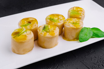 sweet pancake rolls with kiwi