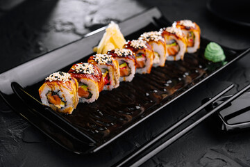 Traditional canada sushi roll on plate