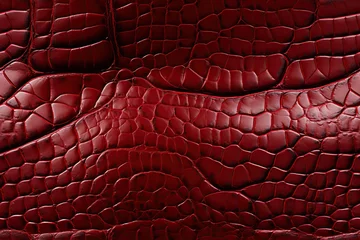 Zelfklevend Fotobehang texture of red crocodile leather with seamless pattern. Genuine natural animal skin © alexkoral
