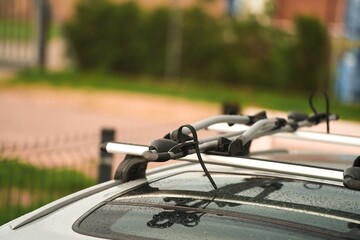 Bike transportation. Bicycles on the roof of a car against a beautiful sky. Transportation and...