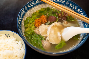 Blood pork pudding soup is Thai Style Blood Jelly with Offal Soup. Famous street food in Thailand.