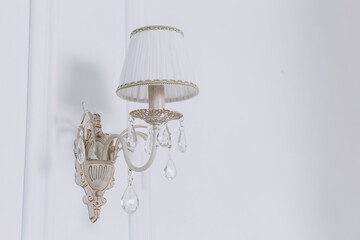 Cozy flat apartment photo studio room green Christmas Tree gifts presents garlands, candles white decorated toys balls interior New Year lights glowing bokeh

