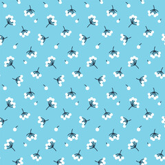 Vector seamless pattern with white berries on a blue background