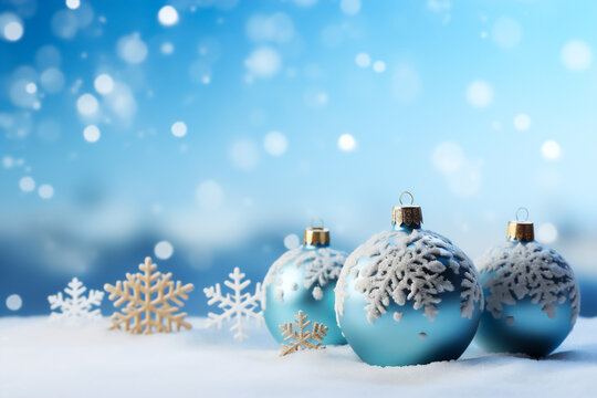 Image of blue Christmas balls and snowflakes on a snowy background. This image can be used as a greeting card or as a background for a holiday related website or advertisement.