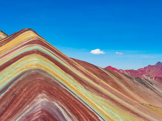 Spectacular view of the vivid colors of Vinicunca mountain on a bright sunny day, Cusco region, Peru