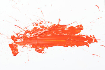 Acrylic paint blot, chaotic brushstroke, spot flowing on white paper background. Creative orange color backdrop, fluid art.