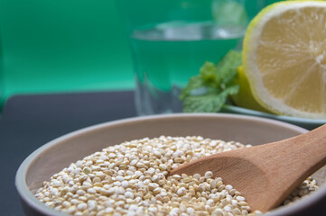royal quinoa in bowl wooden spoon