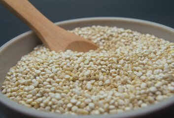 royal quinoa in bowl wooden spoon