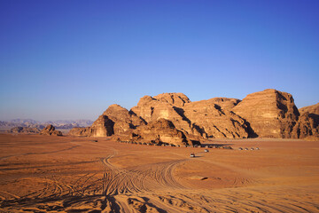 Fototapeta na wymiar Beautiful orange sands dune of Wadi Rum desert the unique landscape