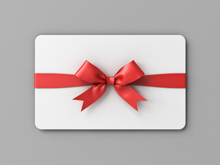 White gift card or gift voucher with red ribbon bow isolated on grey background with shadow minimal conceptual 3D rendering