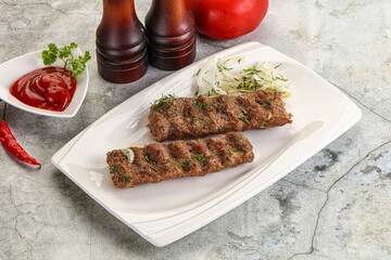 Kebab with beef served onion