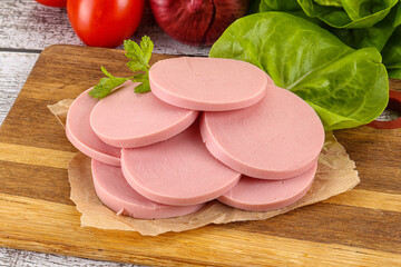 Slices boiled sausages for breakfast