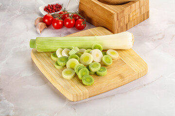 Ripe sliced leek over board