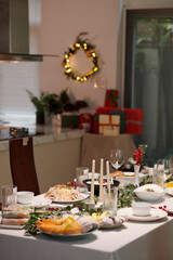 Christmas dinner table with various traditional Vietnamese dishes