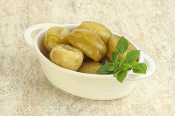 Pickled green tomato in the bowl