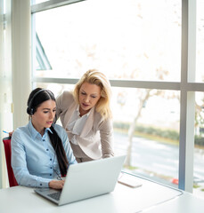 Telemarketing involves manager and employee providing customer service in call center or engaging in conversations with the help desk.