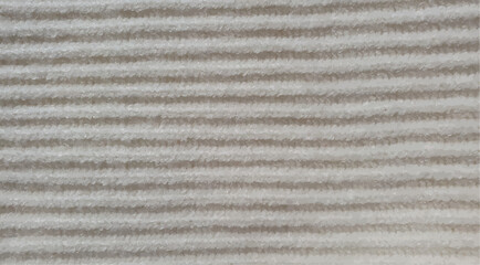 Vector white knitted line texture.
Texture of white knitted clothes vector. Knitting lines for interior decor. Parallel white lines. Geometric knitted background. White texture of knitted clothing.