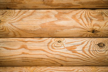 Natural background pattern of log wall. Construction of houses made of wood, rounded timber - obrazy, fototapety, plakaty