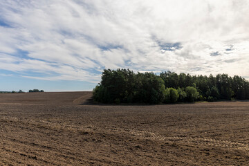 the soil plowed in the field during the preparation of the field