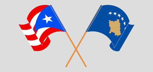 Crossed and waving flags of Puerto Rico and Kosovo