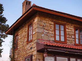 travel to ancient city of Side, Antalya coast of Turkey in tourist low season. traditional Turkish houses on narrow streets of Side. evening time without people