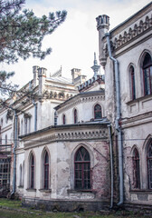 Fototapeta na wymiar The old palace yard concept phot. Neo-gothic building in European town.
