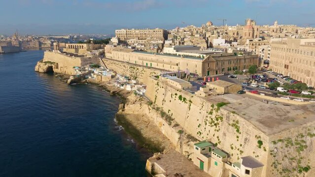 Aerial drone view of Valletta city - MCC, Lower Barrakka Gardens. Morning, Malta island
